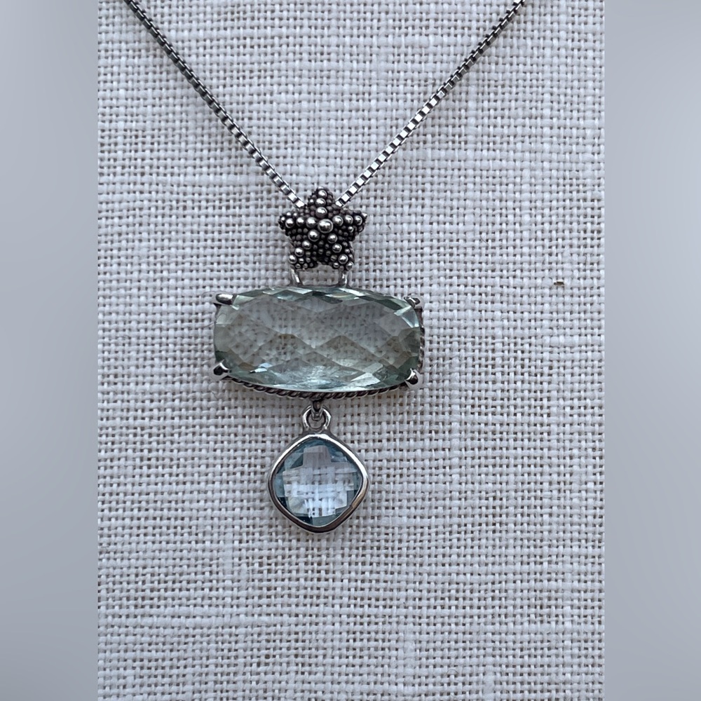 Beautiful sterling silver necklace set with amethyst and blue topaz